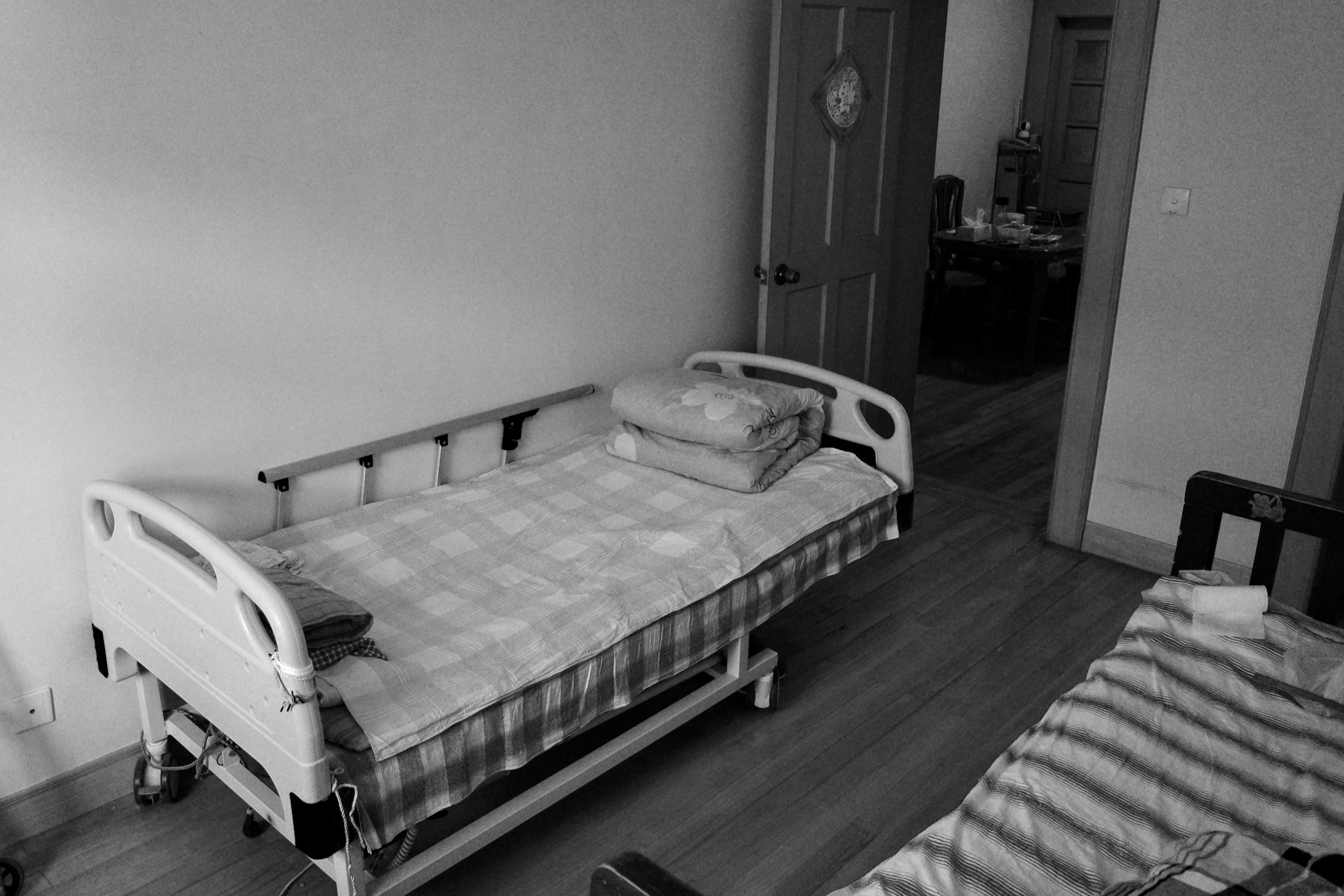 Empty twin beds in my parents' bedroom