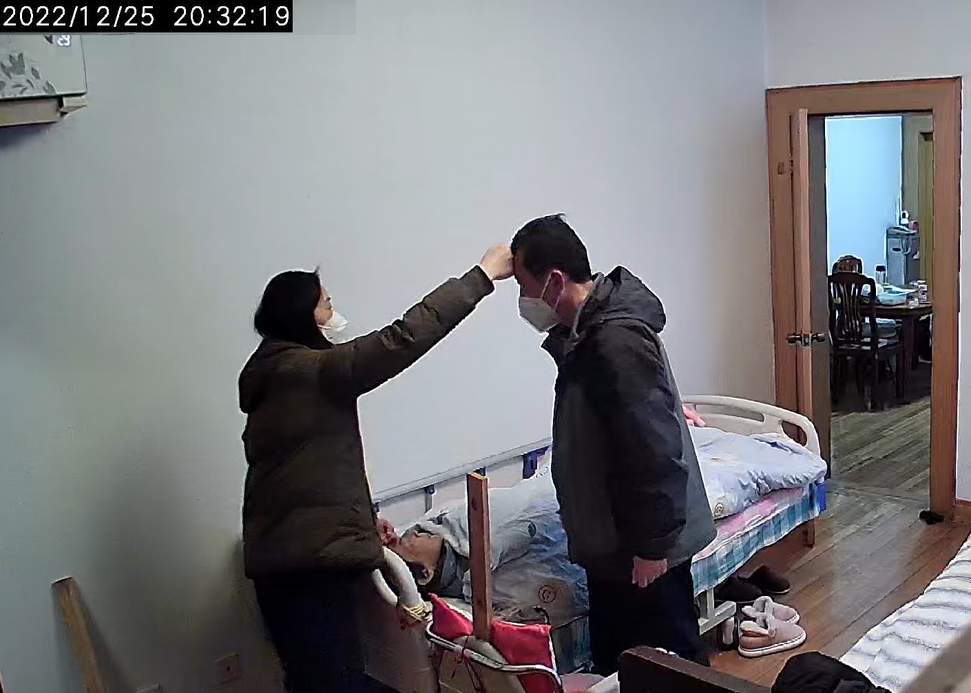 Security camera still of my mother in her final days